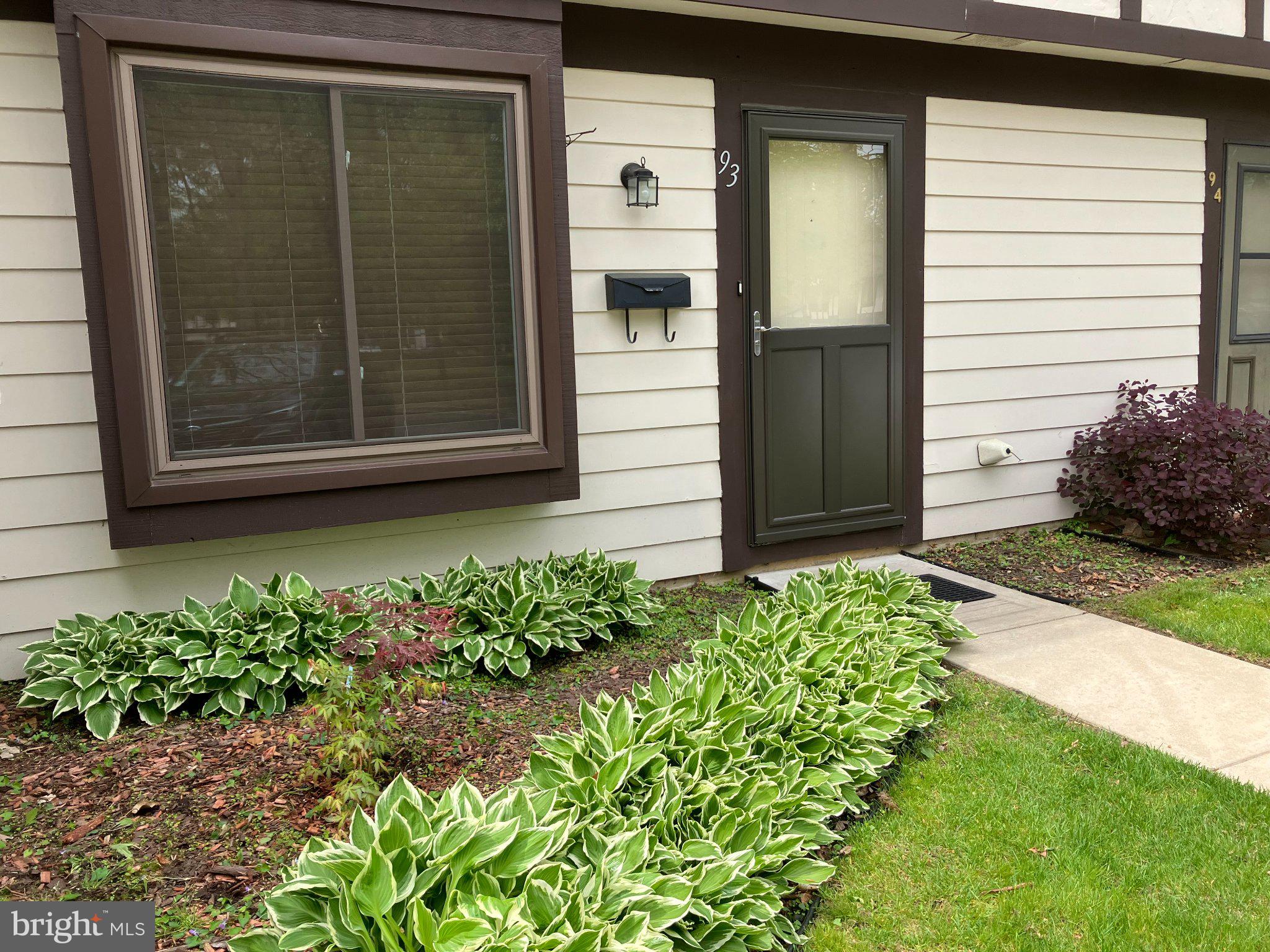 93 Beechnut Court Lumberton, NJ 08048 - Photo 2 of 28 a front view of a house with a yard