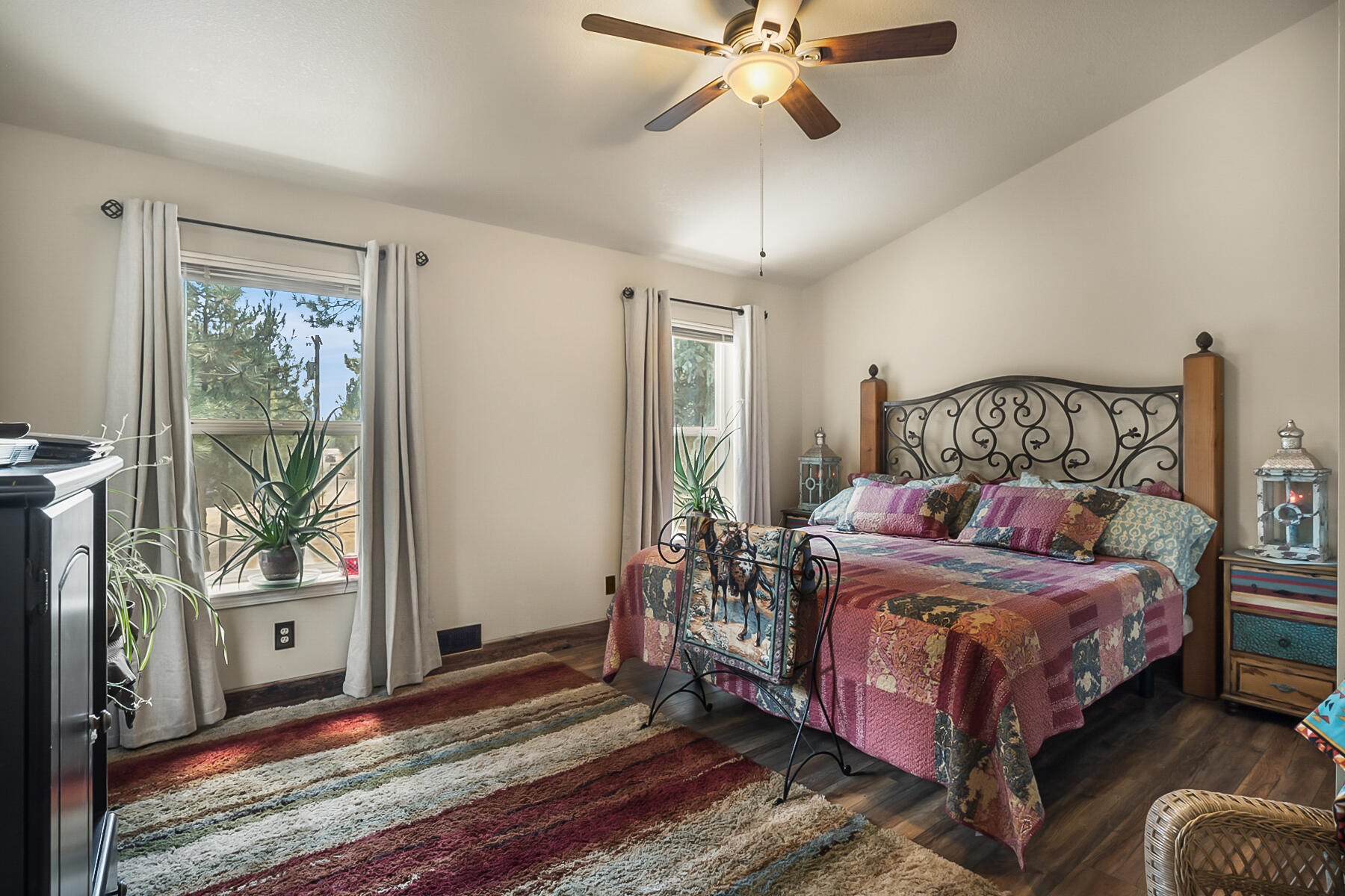 15730 Jackpine Road La Pine, OR 97739 - Photo 23 of 43 a bedroom with a bed and large window