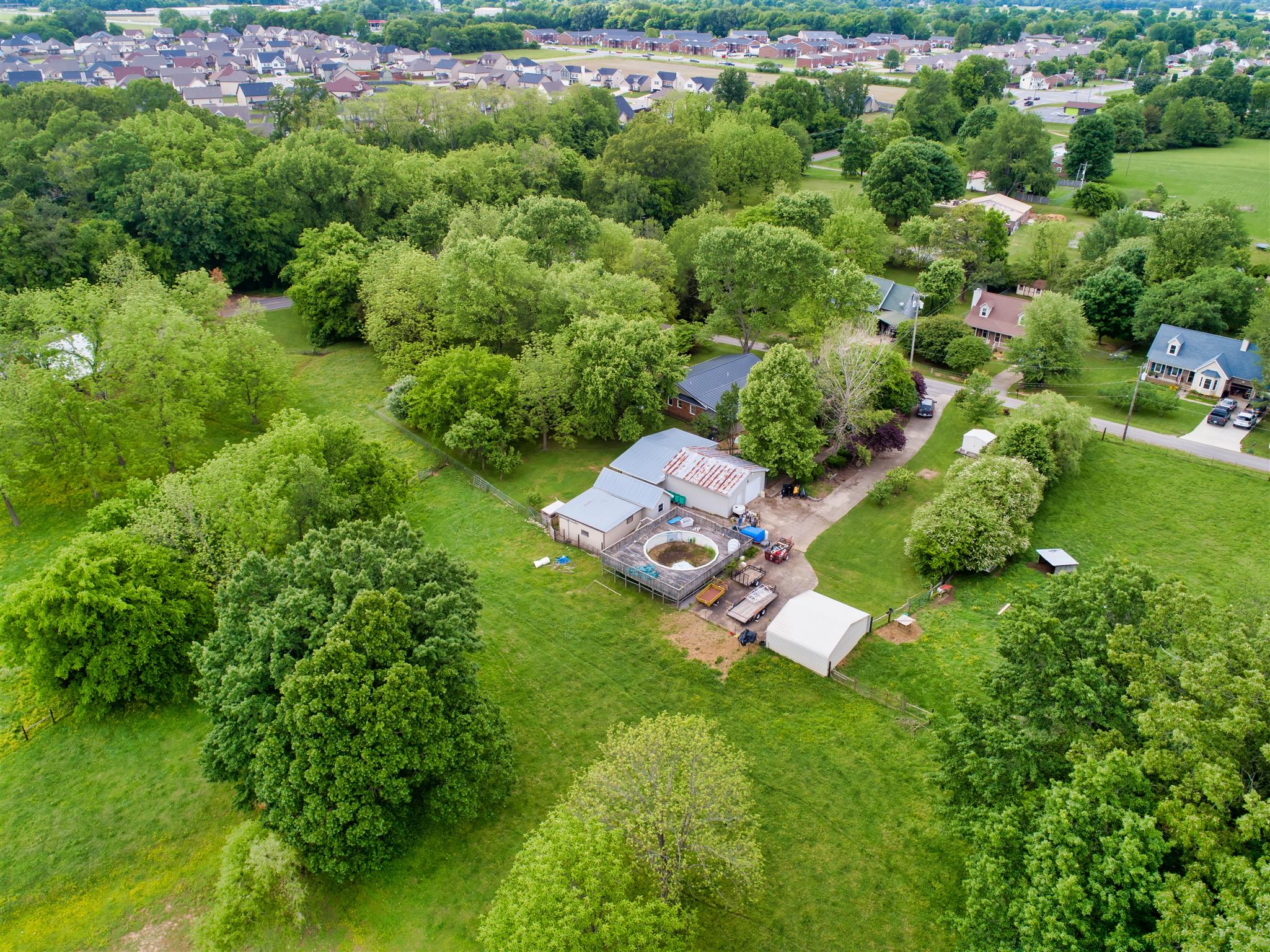 800 Hadley Road Clarksville, TN 37042 - Photo 4 of 17 an aerial view of residential house with outdoor space and trees all around