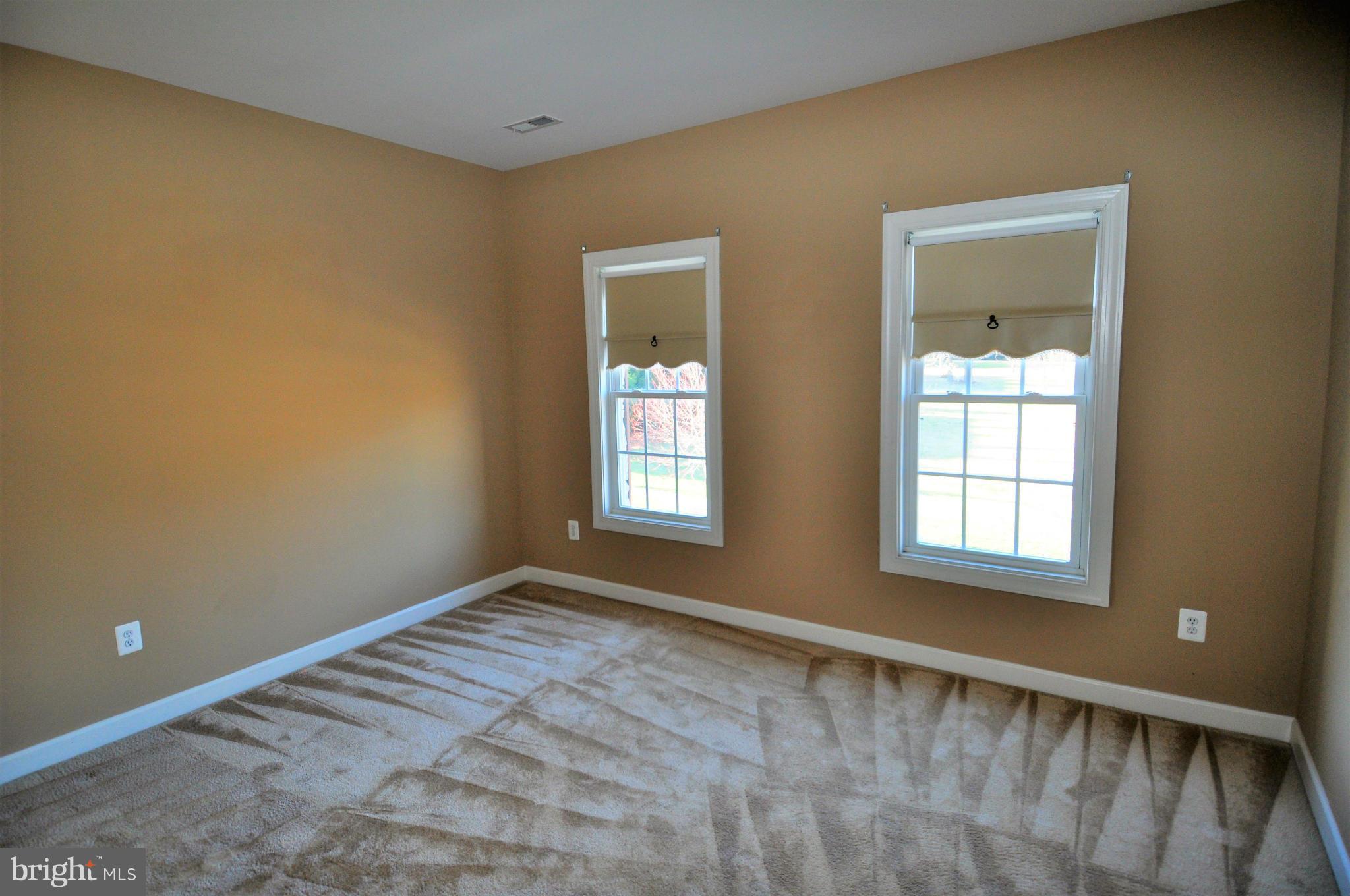 10827 Catron Road Perry Hall, MD 21128 - Photo 12 of 27 a view of an empty room with a window