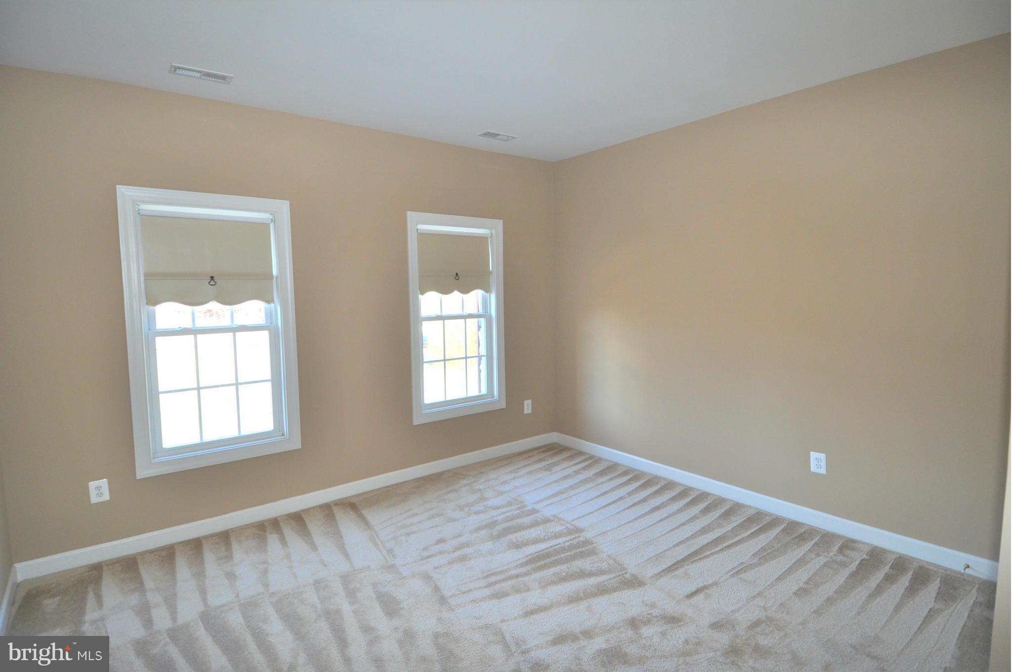 10827 Catron Road Perry Hall, MD 21128 - Photo 13 of 27 a view of an empty room with a window