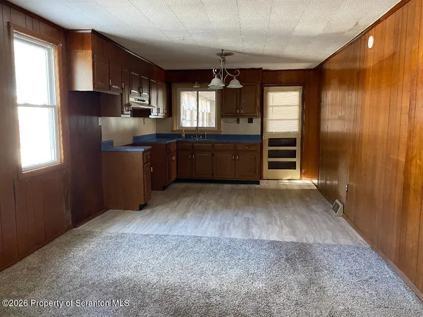 a view interior of kitchen and window