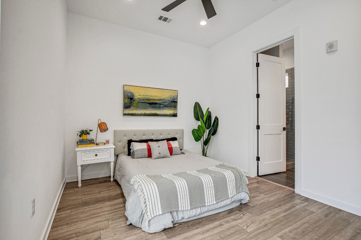 2804 South 1st Street, Unit 1108 Austin, TX 78704 - Photo 20 of 40 a bedroom with a bed and a table