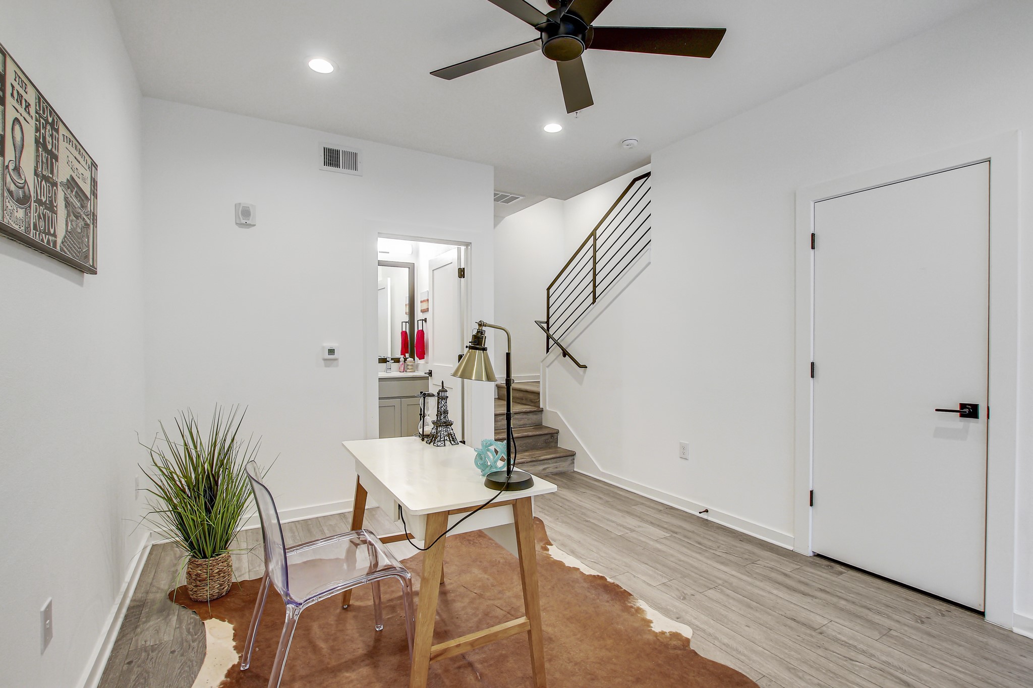 2804 South 1st Street, Unit 1108 Austin, TX 78704 - Photo 24 of 40 a workspace with wooden floor and entryway