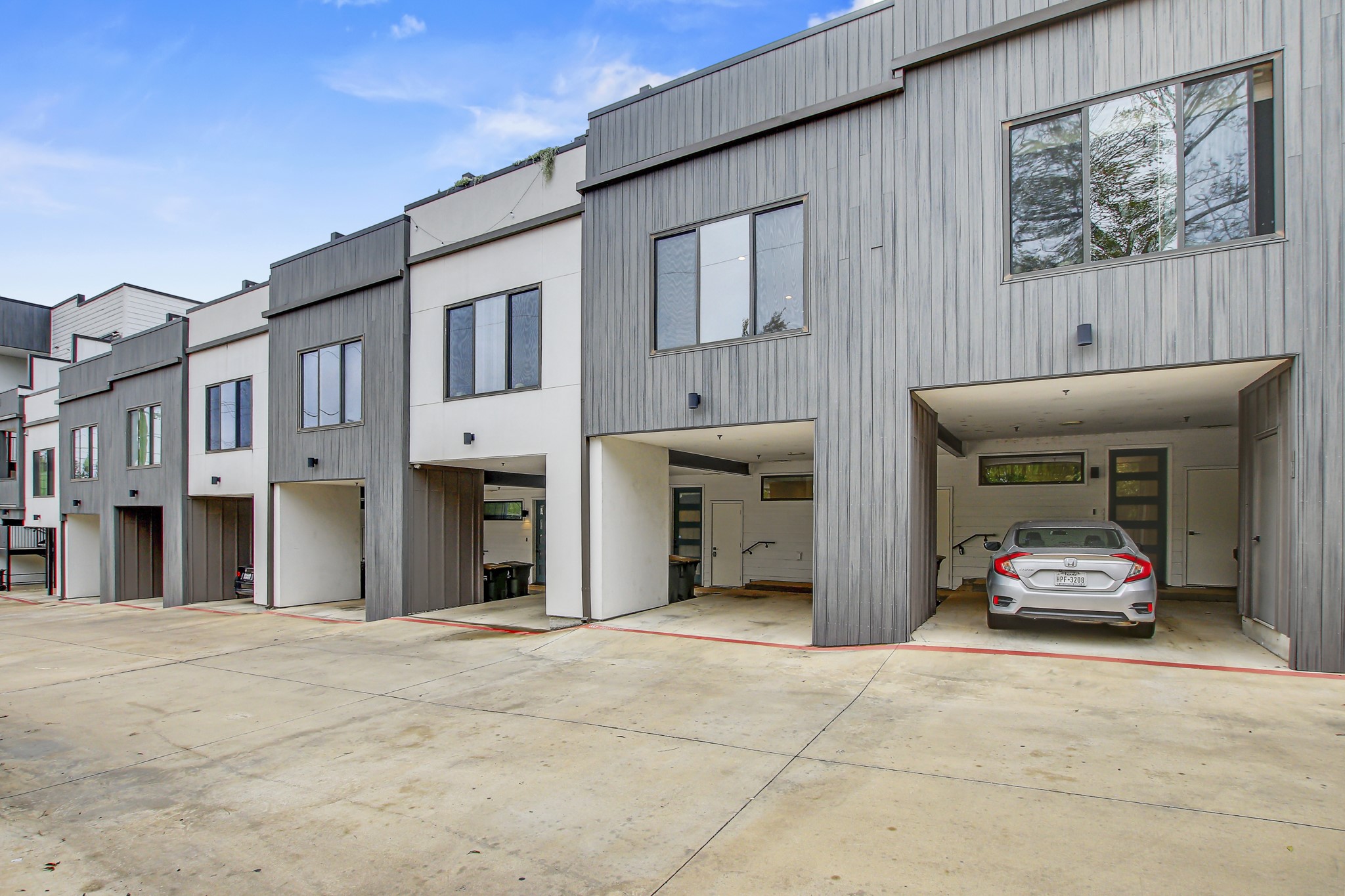2804 South 1st Street, Unit 1108 Austin, TX 78704 - Photo 32 of 40 a car parked in front of a building