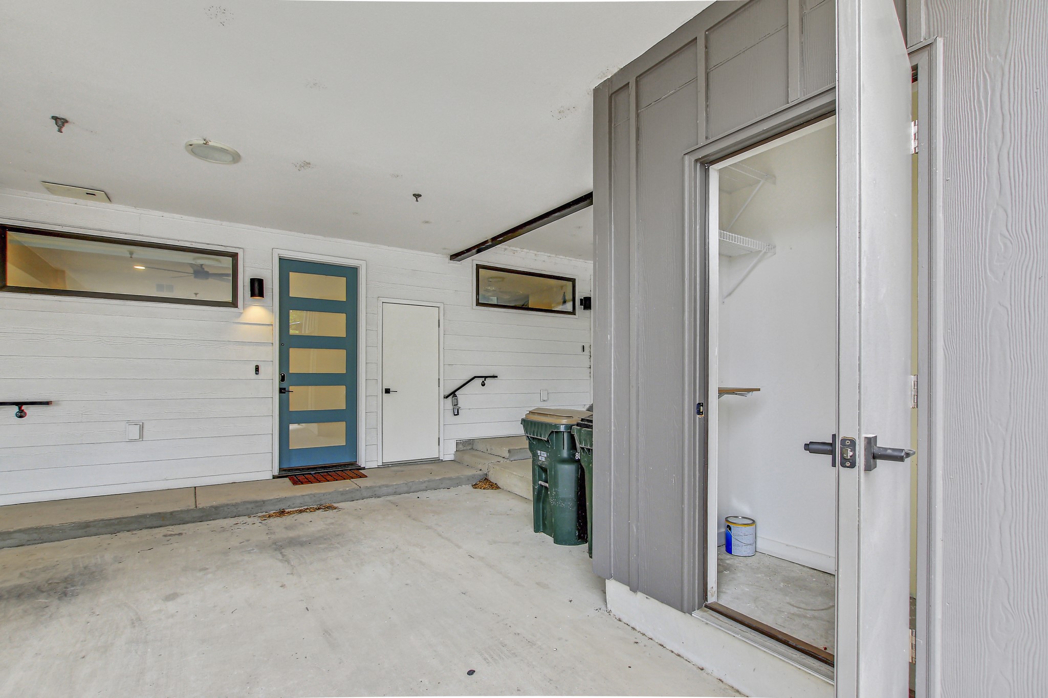 2804 South 1st Street, Unit 1108 Austin, TX 78704 - Photo 34 of 40 a view of a hallway with wooden shelves
