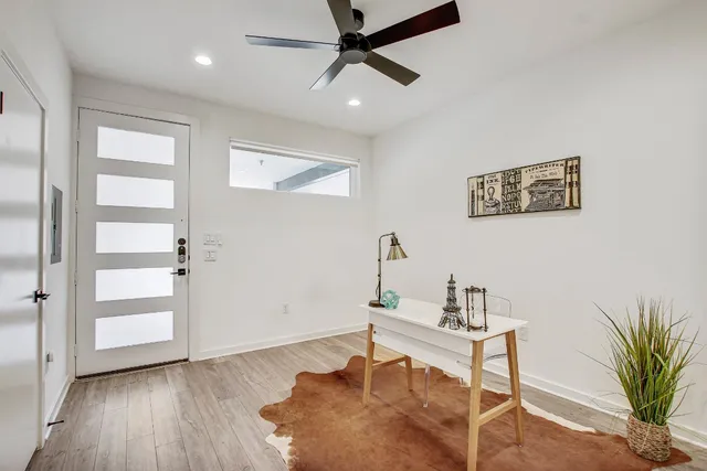 a workspace with furniture and window