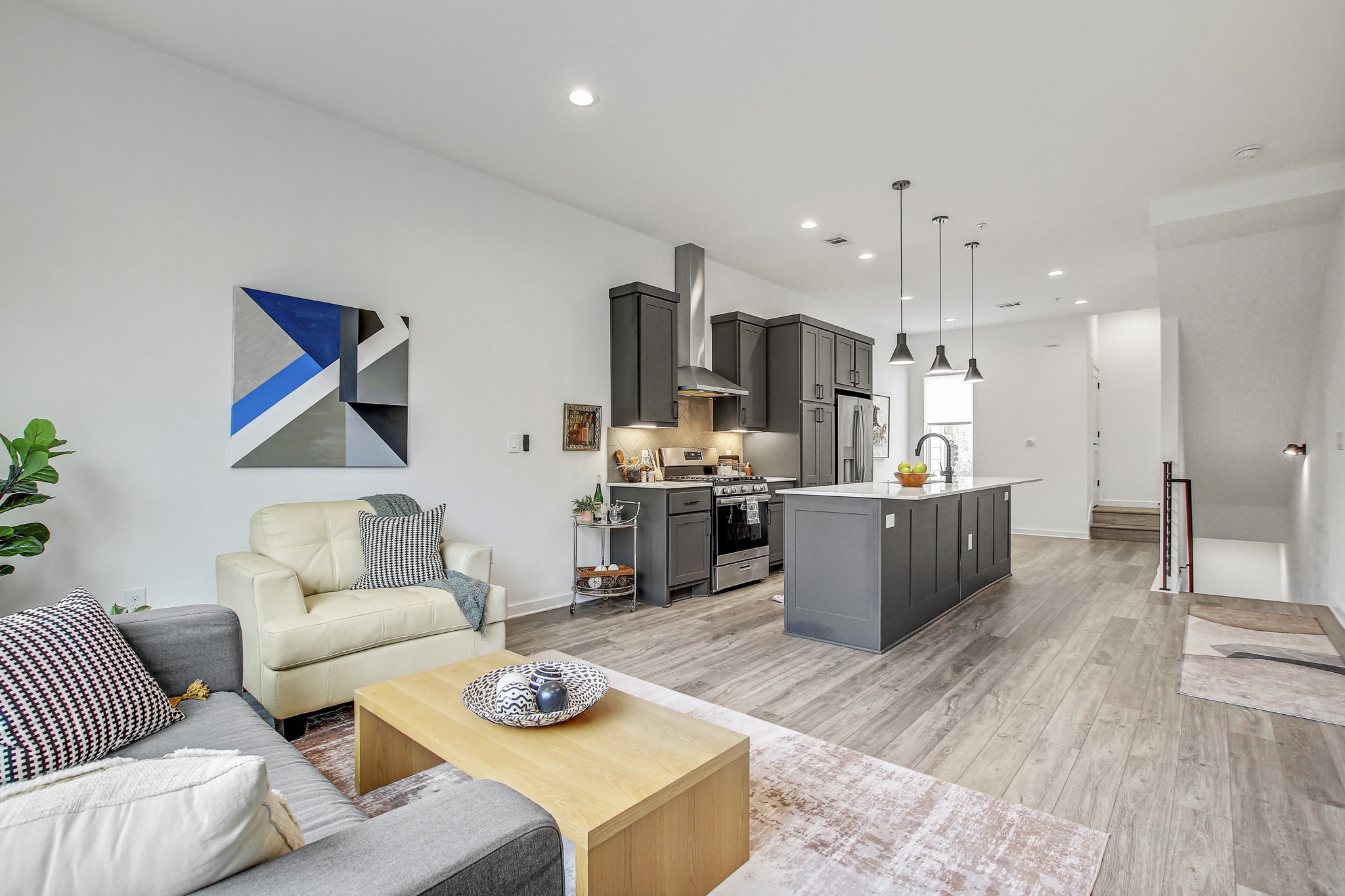 2804 South 1st Street, Unit 1108 Austin, TX 78704 - Photo 6 of 40 a living room with furniture kitchen and a table