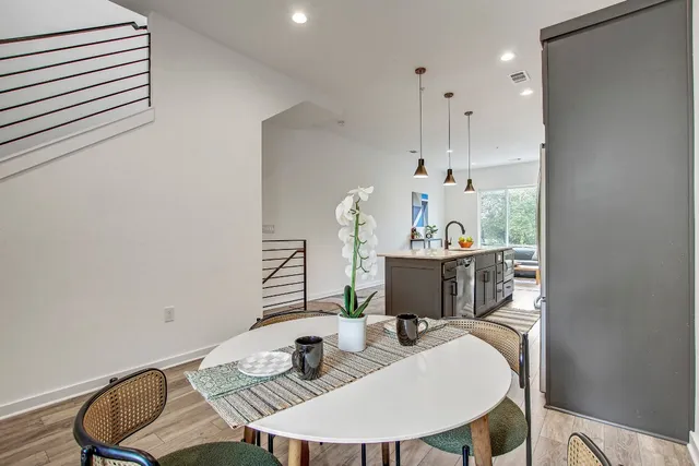 a view of a dining room with furniture