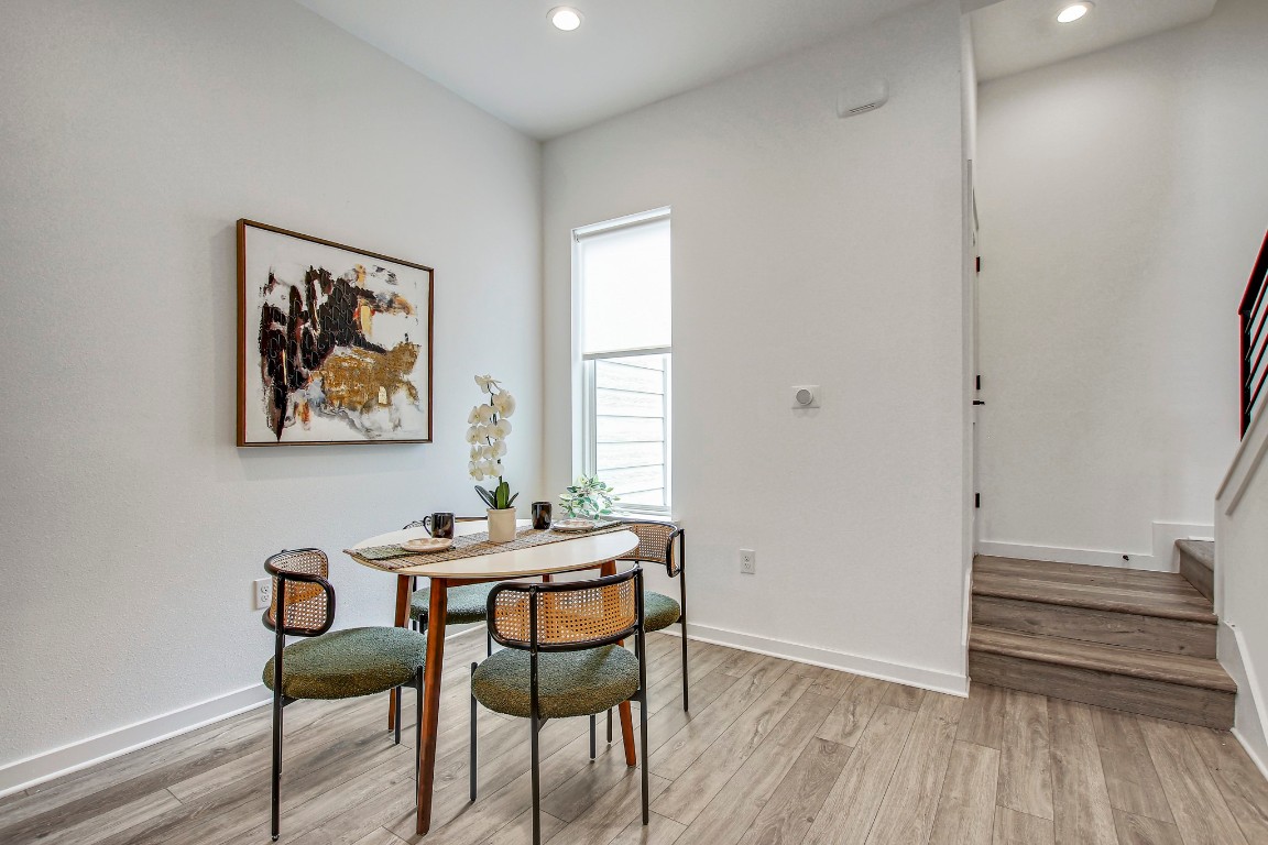 2804 South 1st Street, Unit 1108 Austin, TX 78704 - Photo 10 of 40 a dining room with furniture and wooden floor