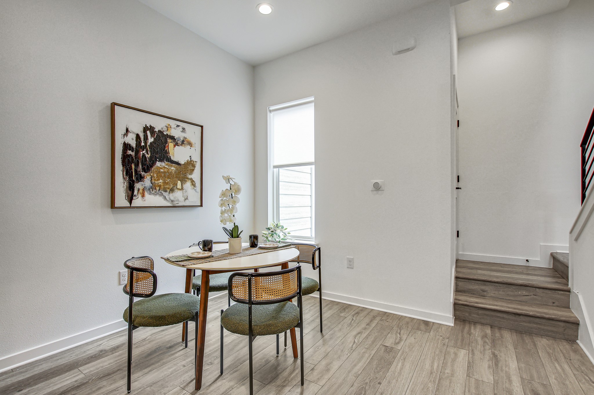 2804 South 1st Street, Unit 1108 Austin, TX 78704 - Photo 10 of 40 a dining room with furniture and wooden floor