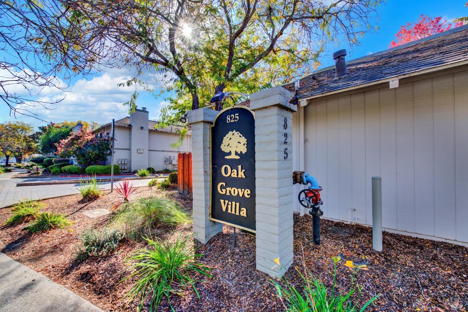 825 Oak Grove Road, Unit 8 Concord, CA 94518 - Photo 1 of 1 a front view of a house with garden