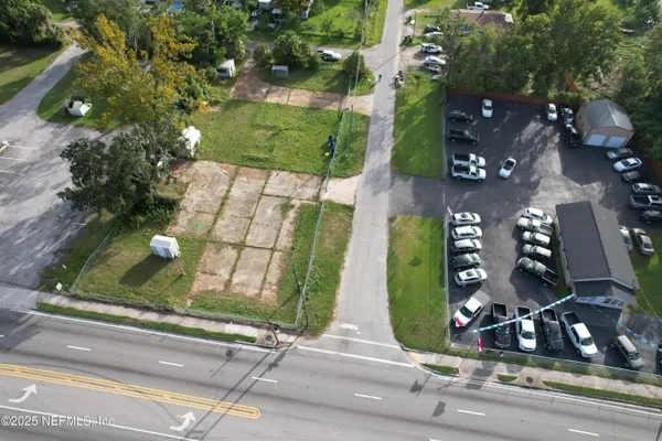 a view of a lake with a yard