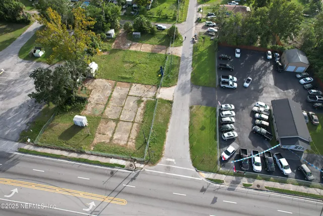 a view of a lake with a yard