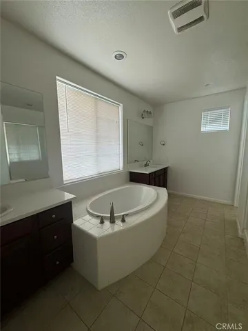 a view of a bathtub in a room