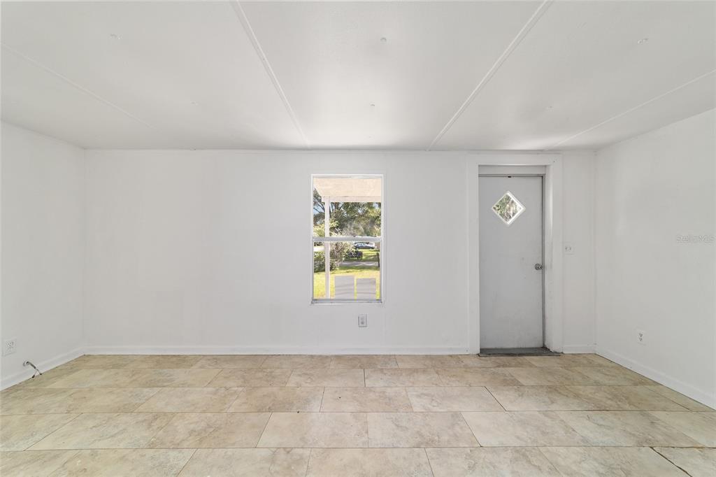 3081 Southwest 90th Street Ocala, FL 34476 - Photo 11 of 34 a view of an empty room and window