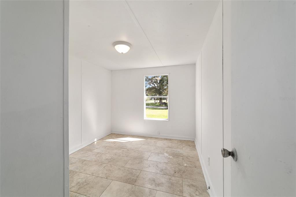 3081 Southwest 90th Street Ocala, FL 34476 - Photo 30 of 34 a view of an empty room and window