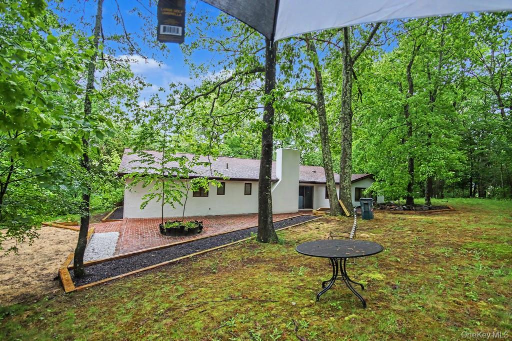 18 Hillside View Road Mahopac, NY 10541 - Photo 40 of 42 a garden view with a seating space