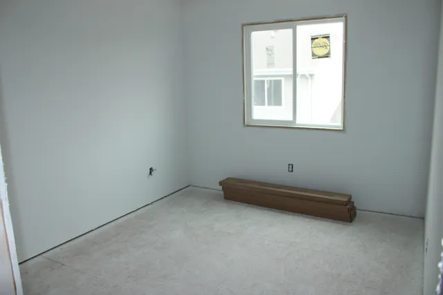 an empty room with a window