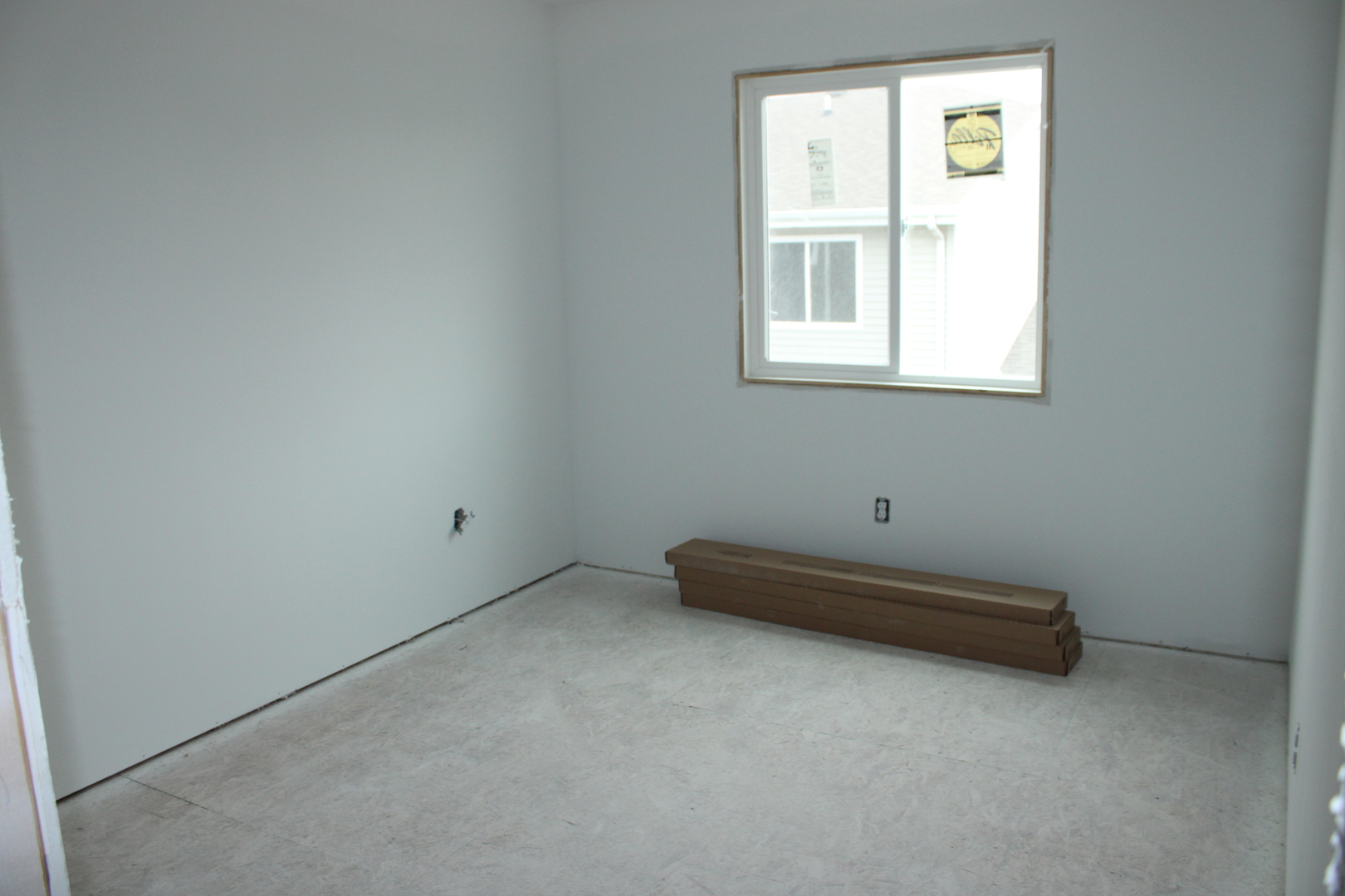 109 East Division Street, Unit 109 Manteno, IL 60950 - Photo 6 of 9 an empty room with a window