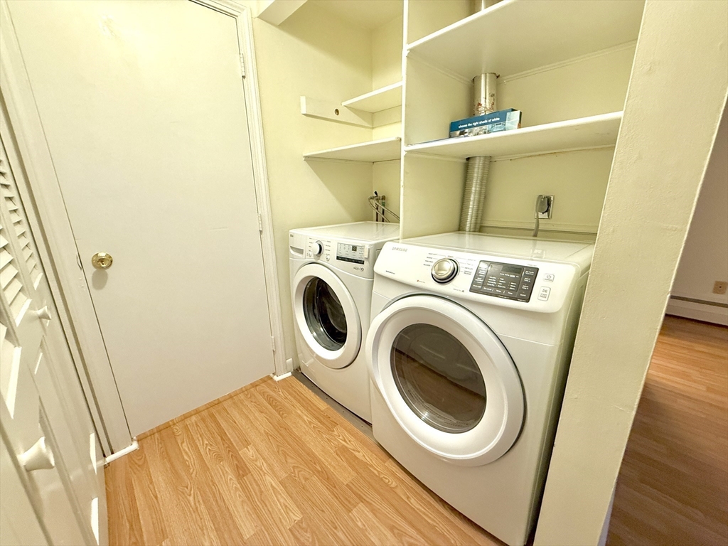 276 Main Street, Unit 3C Acton, MA 01720 - Photo 7 of 12 a utility room with dryer and washer