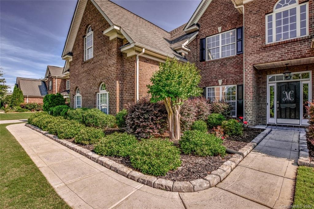 8723 Savannah Road Harrisburg, NC 28075 - Photo 3 of 44 a view of a building with potted plants