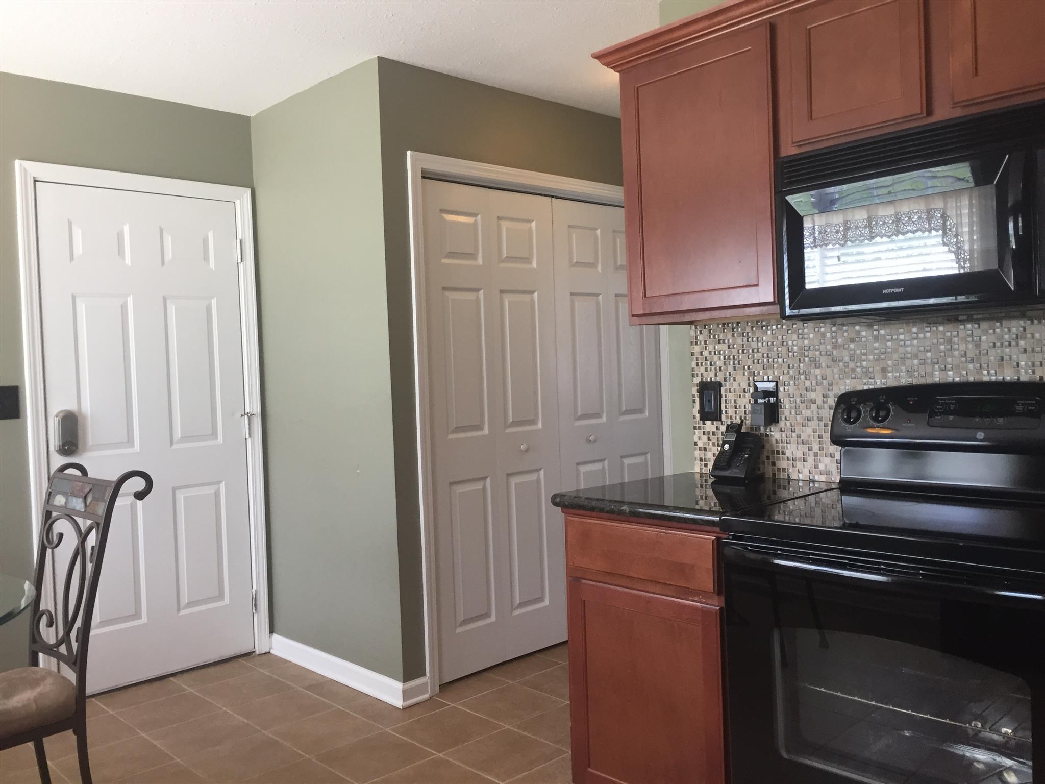 1812 Abrams Road Clarksville, TN 37042 - Photo 11 of 27 Kitchen and laundry closet and door to garage