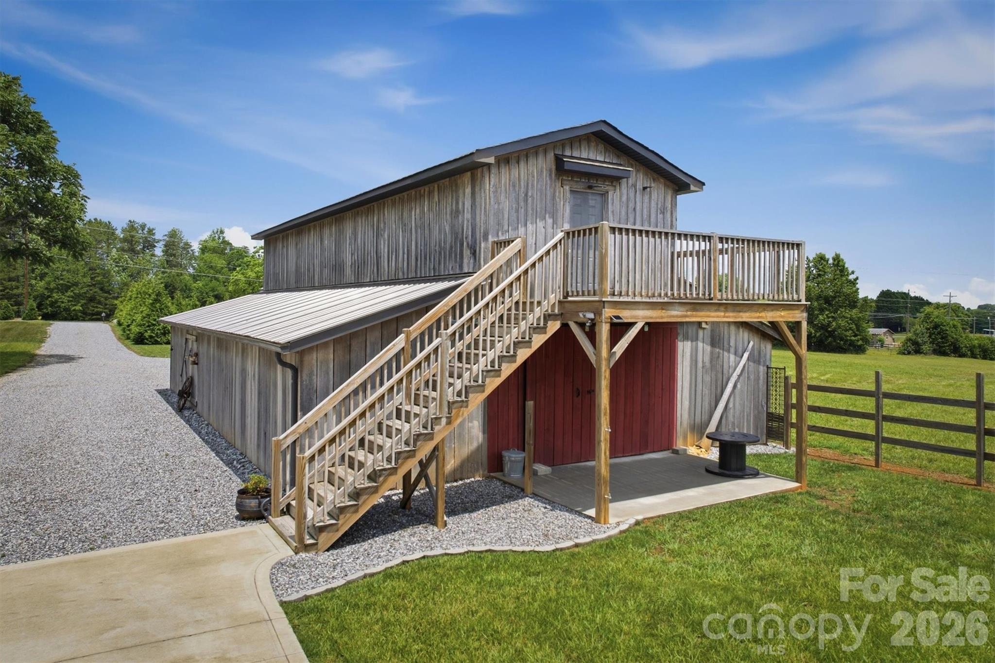7490 Oak Ridge Church Road Connelly Springs, NC 28612 - Photo 39 of 44 a view of a small house with a yard