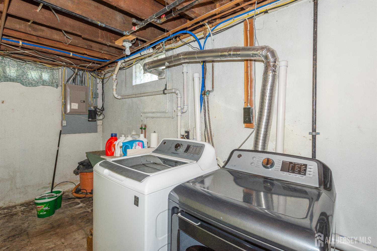 33 Orchard Road Middlesex, NJ 08846 - Photo 14 of 14 a utility room with dryer and washer