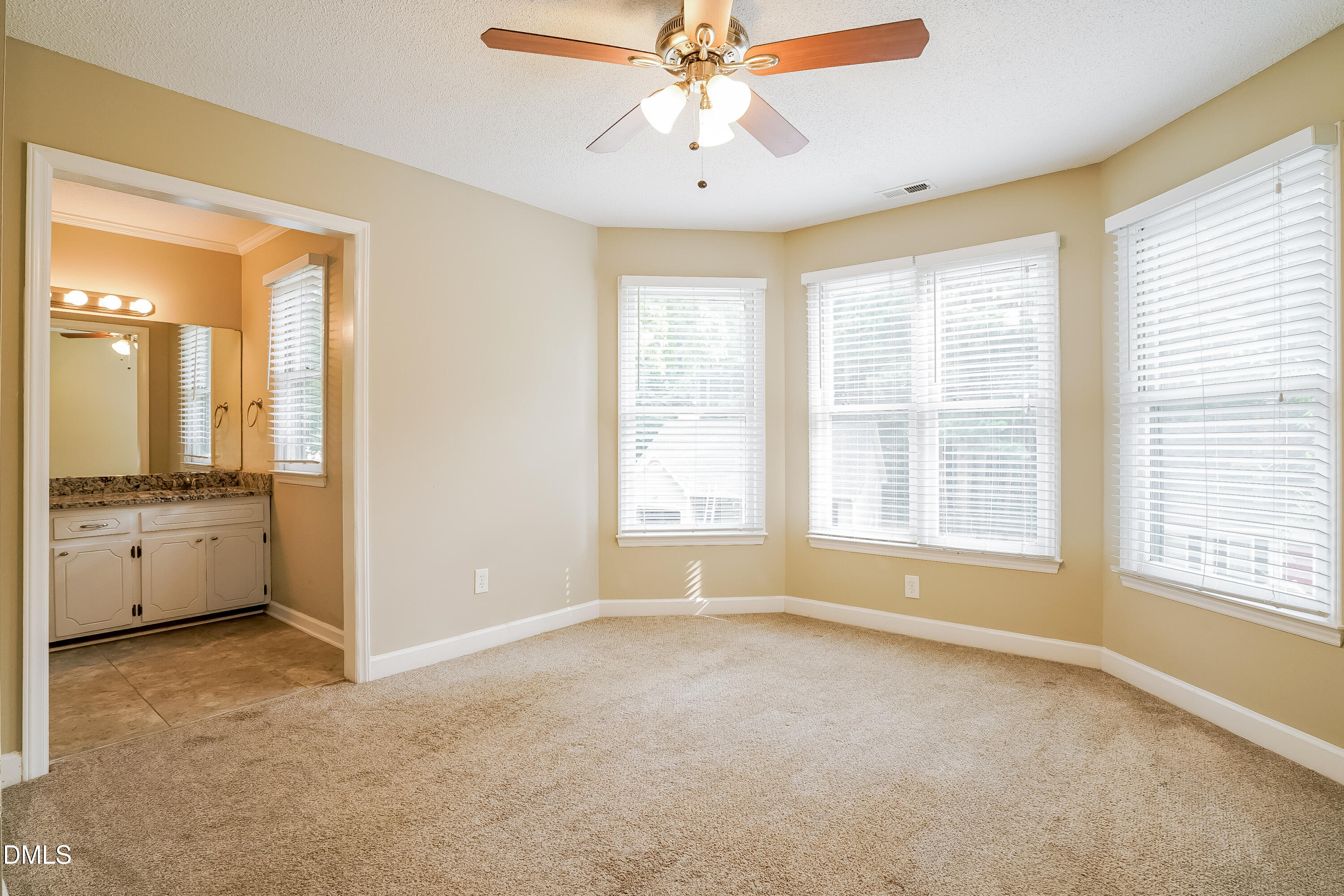 3636 Meadow Creek Lane Raleigh, NC 27616 - Photo 8 of 17 a view of an empty room with a window