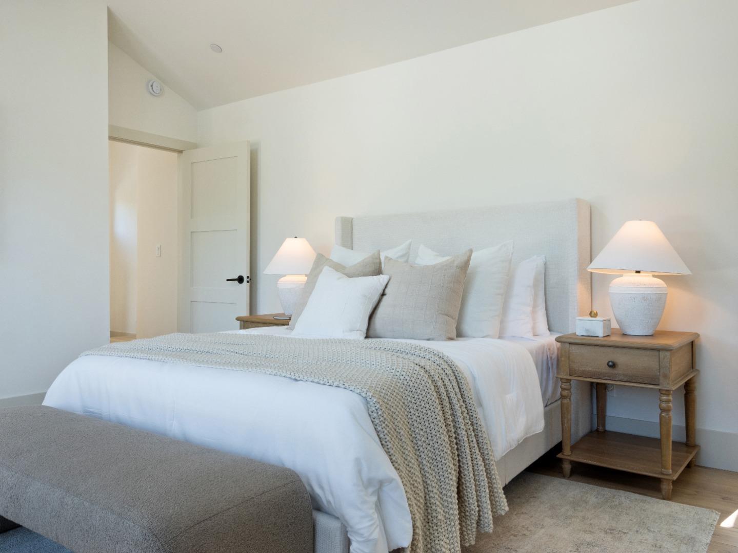 3240 North Main Street Soquel, CA 95073 - Photo 19 of 52 a bedroom with a bed and a lamp