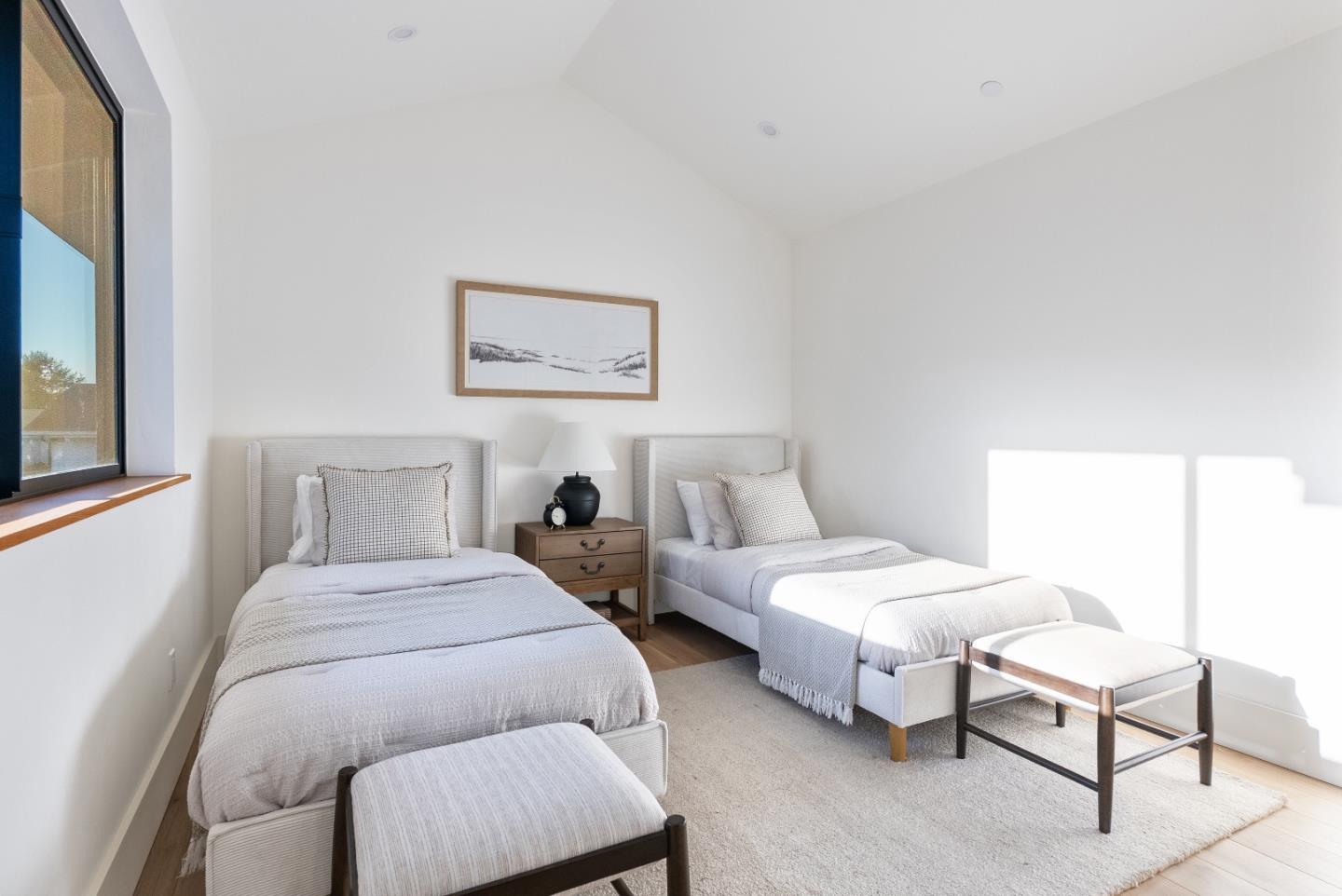 3240 North Main Street Soquel, CA 95073 - Photo 35 of 52 a bedroom with a bed and a painting on the wall