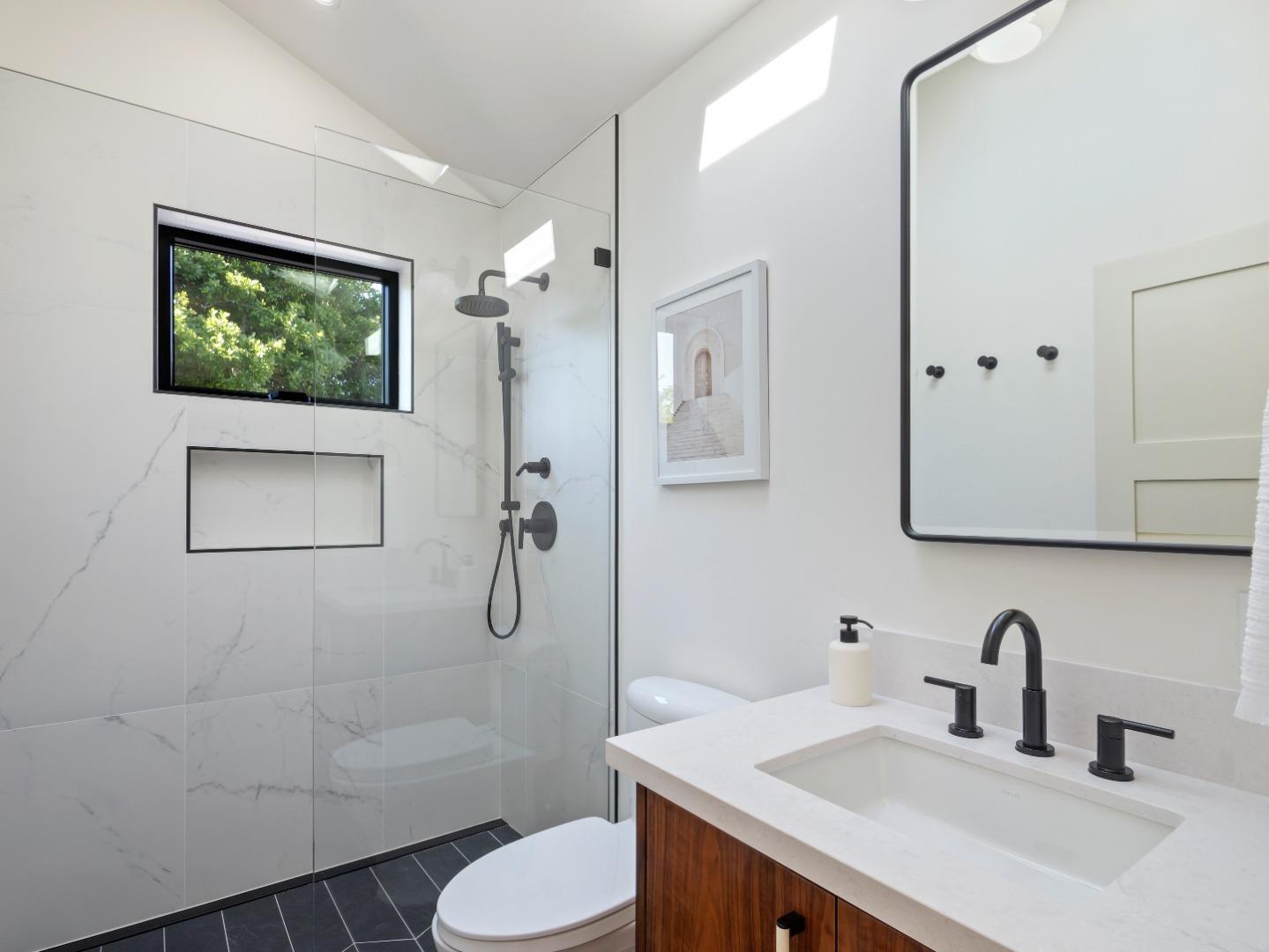 3240 North Main Street Soquel, CA 95073 - Photo 38 of 52 a bathroom with a sink toilet and shower