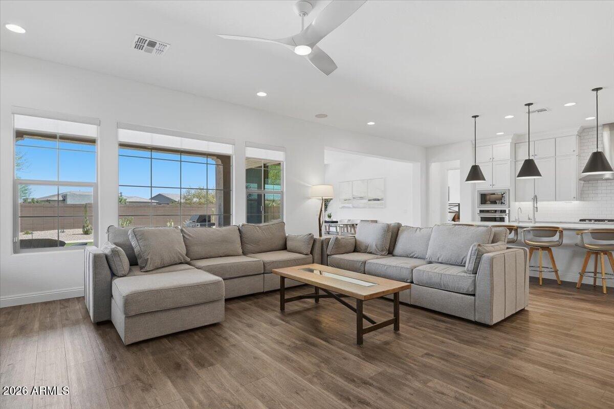 22608 East Stacey Road Queen Creek, AZ 85142 - Photo 17 of 83 a living room with furniture and a large window