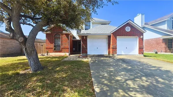 a front view of house with yard