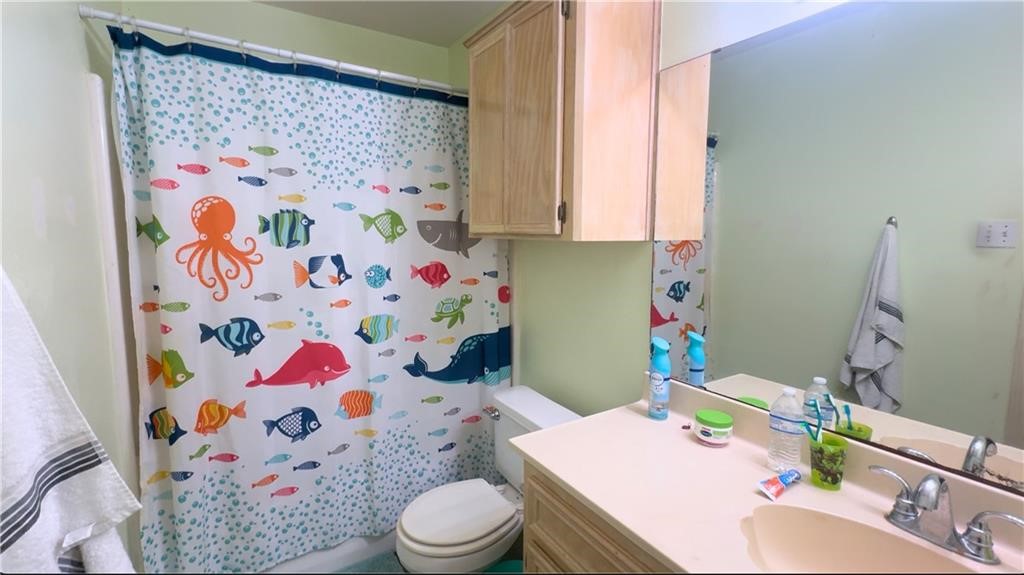 4349 Eldora Drive Corpus Christi, TX 78413 - Photo 16 of 23 a bathroom with a sink toilet and bathtub