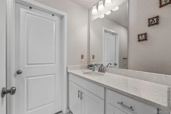 a view of a hallway with washer and dryer