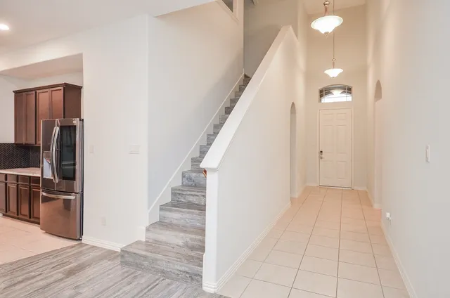 a view of a kitchen from the hallway