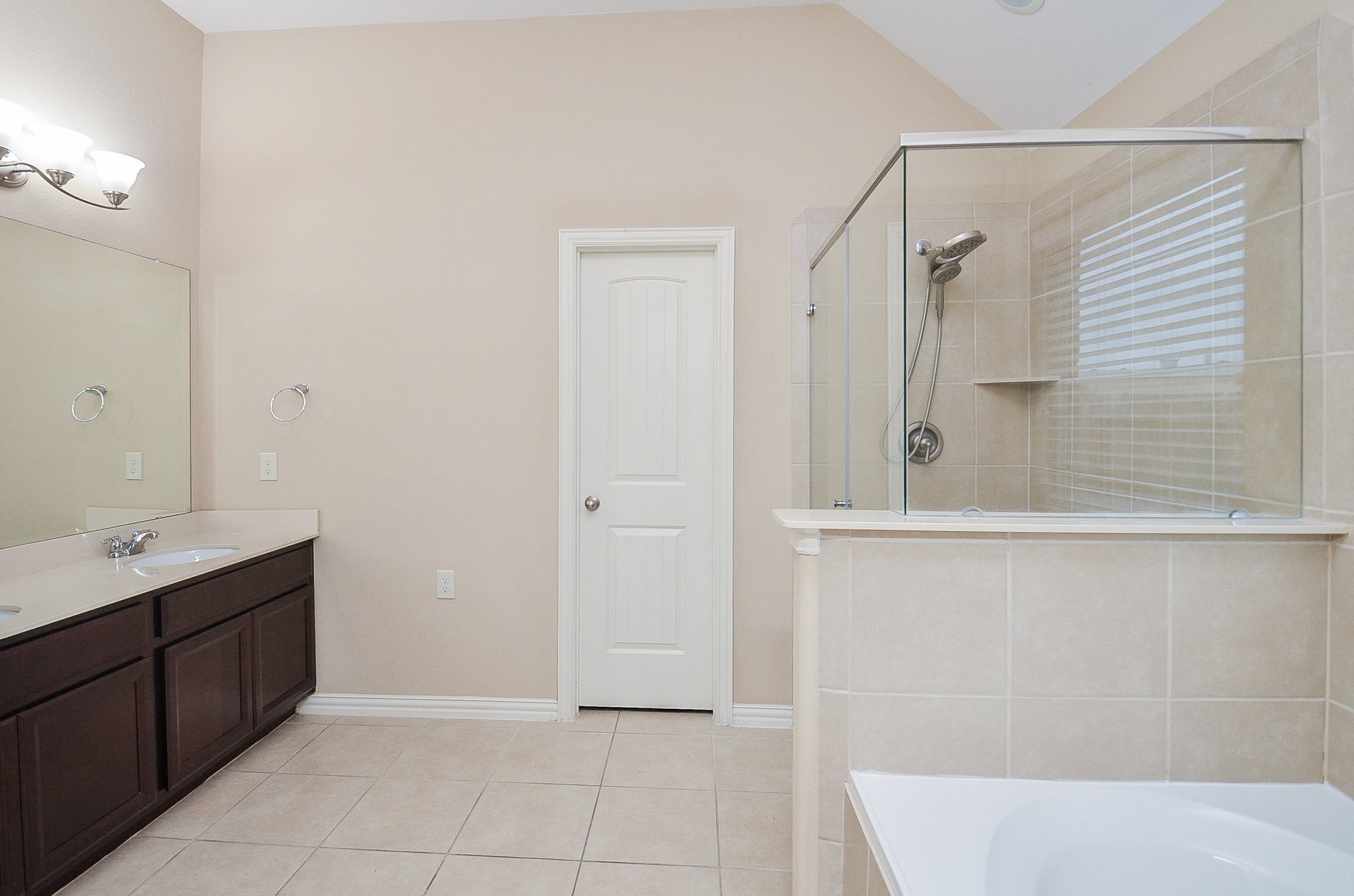 17902 Logans Pine Drive Tomball, TX 77377 - Photo 23 of 32 a bathroom with a bathtub and a sink