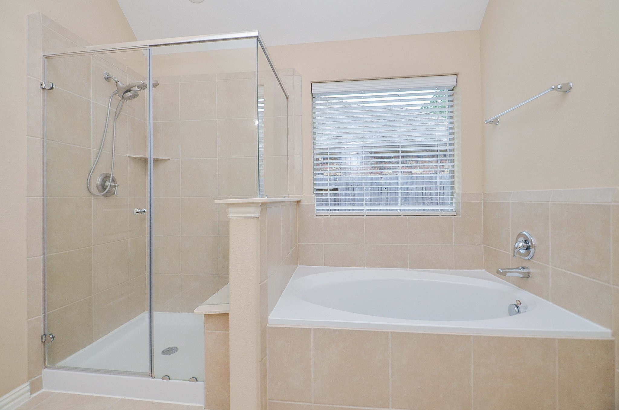 17902 Logans Pine Drive Tomball, TX 77377 - Photo 25 of 32 a white bath tub sitting next to a shower