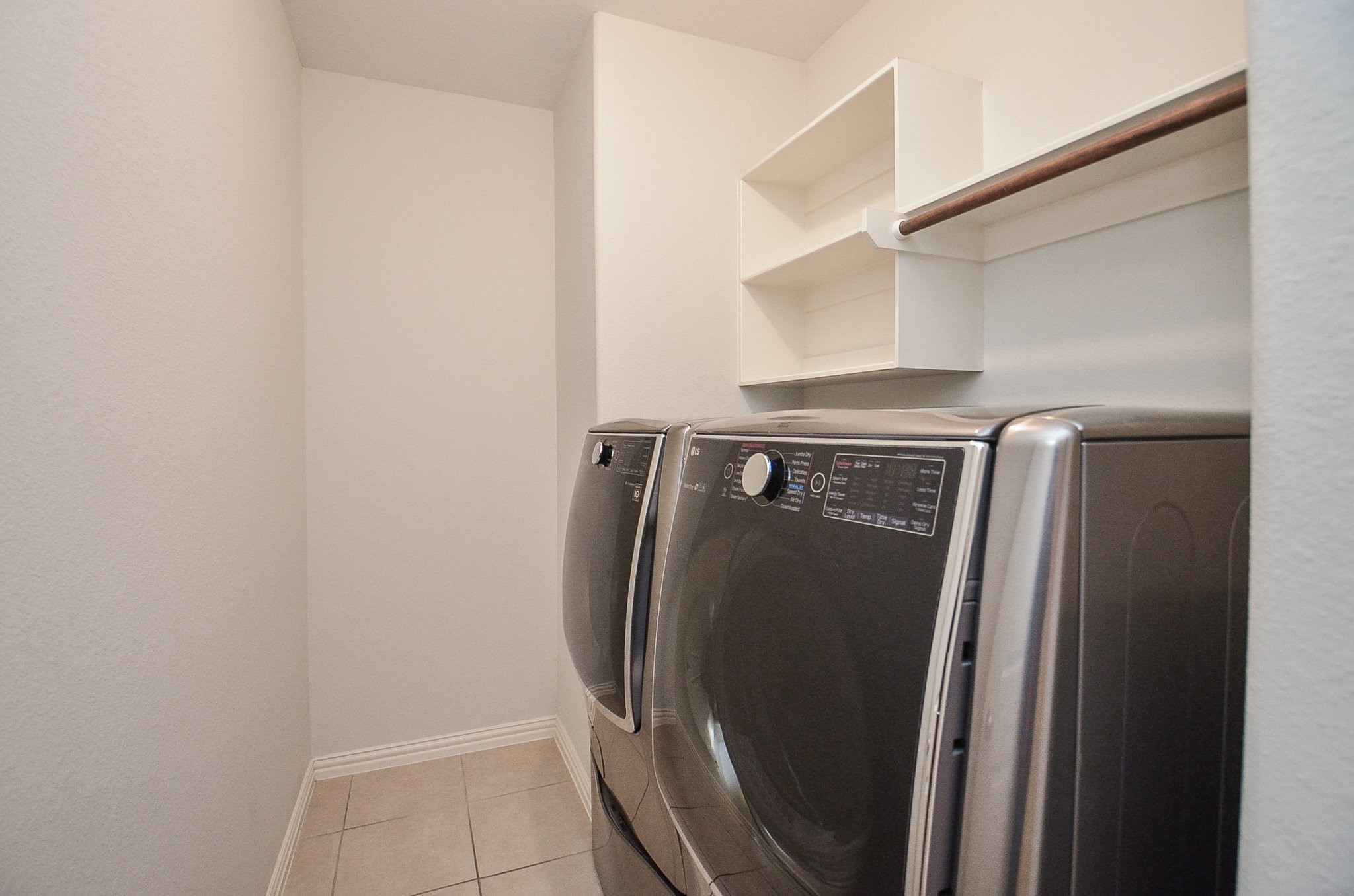 17902 Logans Pine Drive Tomball, TX 77377 - Photo 30 of 32 a view of washer and dryer