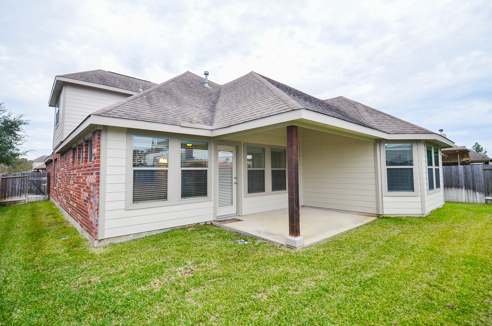 17902 Logans Pine Drive Tomball, TX 77377 - Photo 31 of 32 a view of a house with backyard