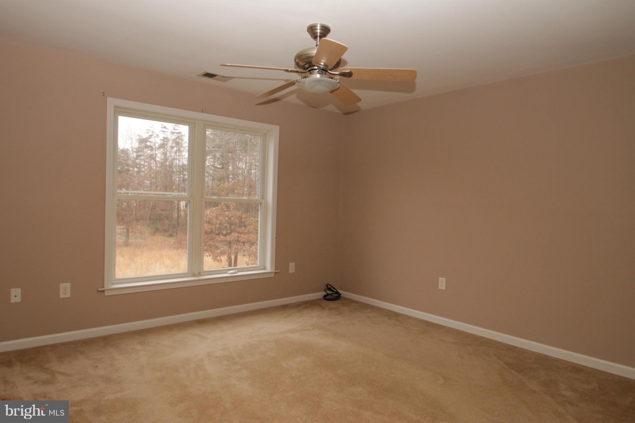 2324 Partlow Road Beaverdam, VA 23015 - Photo 22 of 27 an empty room with a window