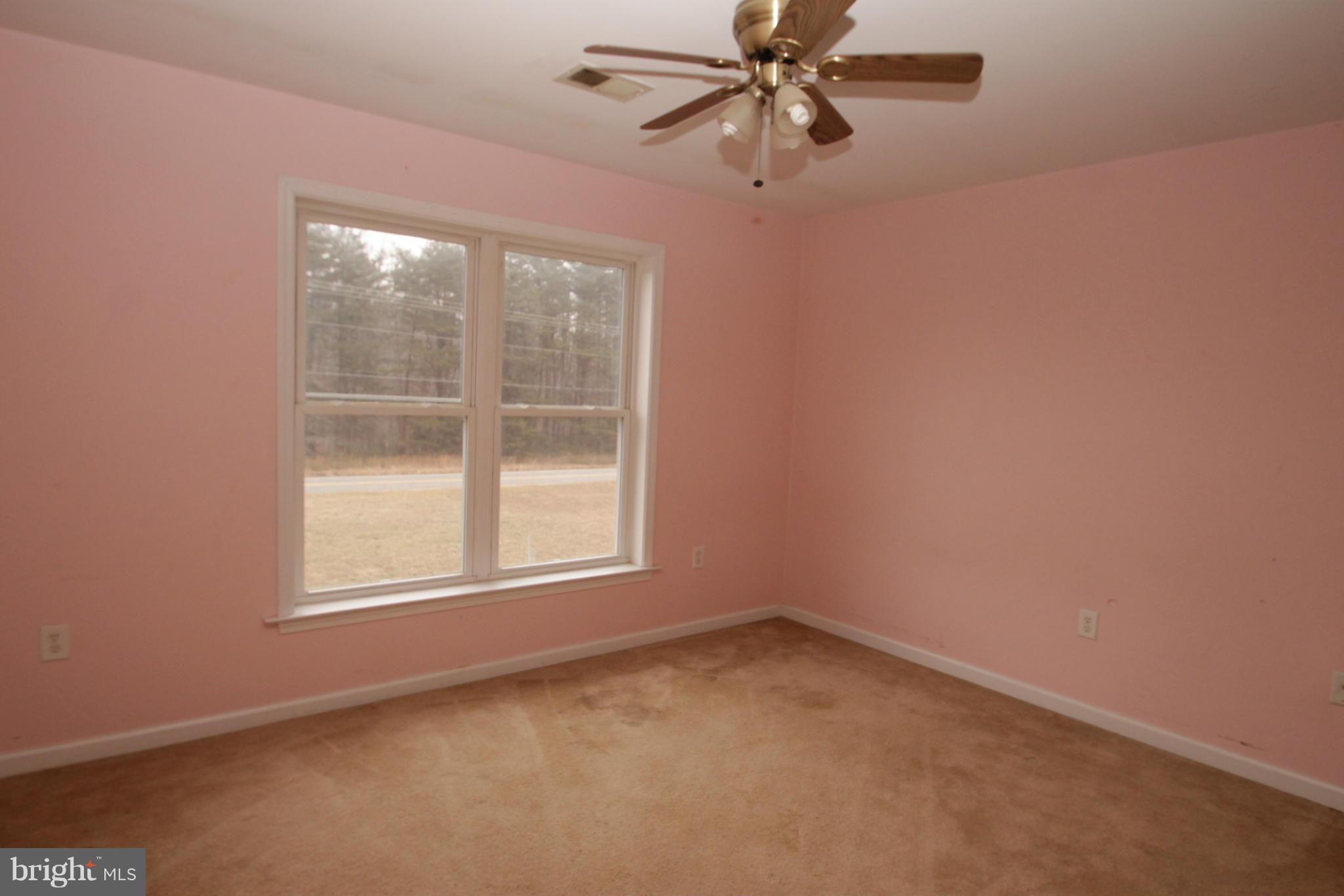 2324 Partlow Road Beaverdam, VA 23015 - Photo 26 of 27 an empty room with a window