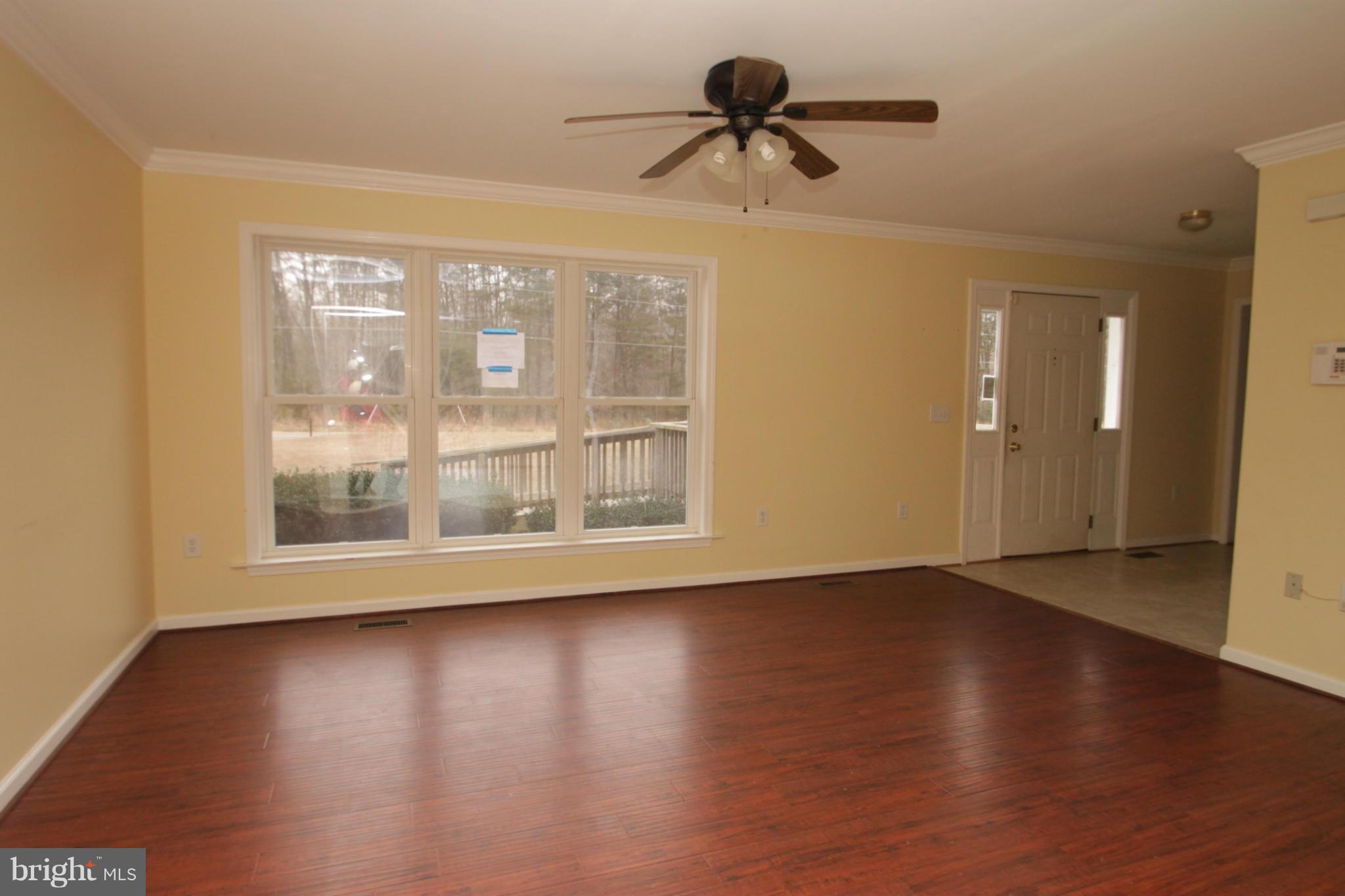 2324 Partlow Road Beaverdam, VA 23015 - Photo 8 of 27 a view of room with hardwood floor and a window
