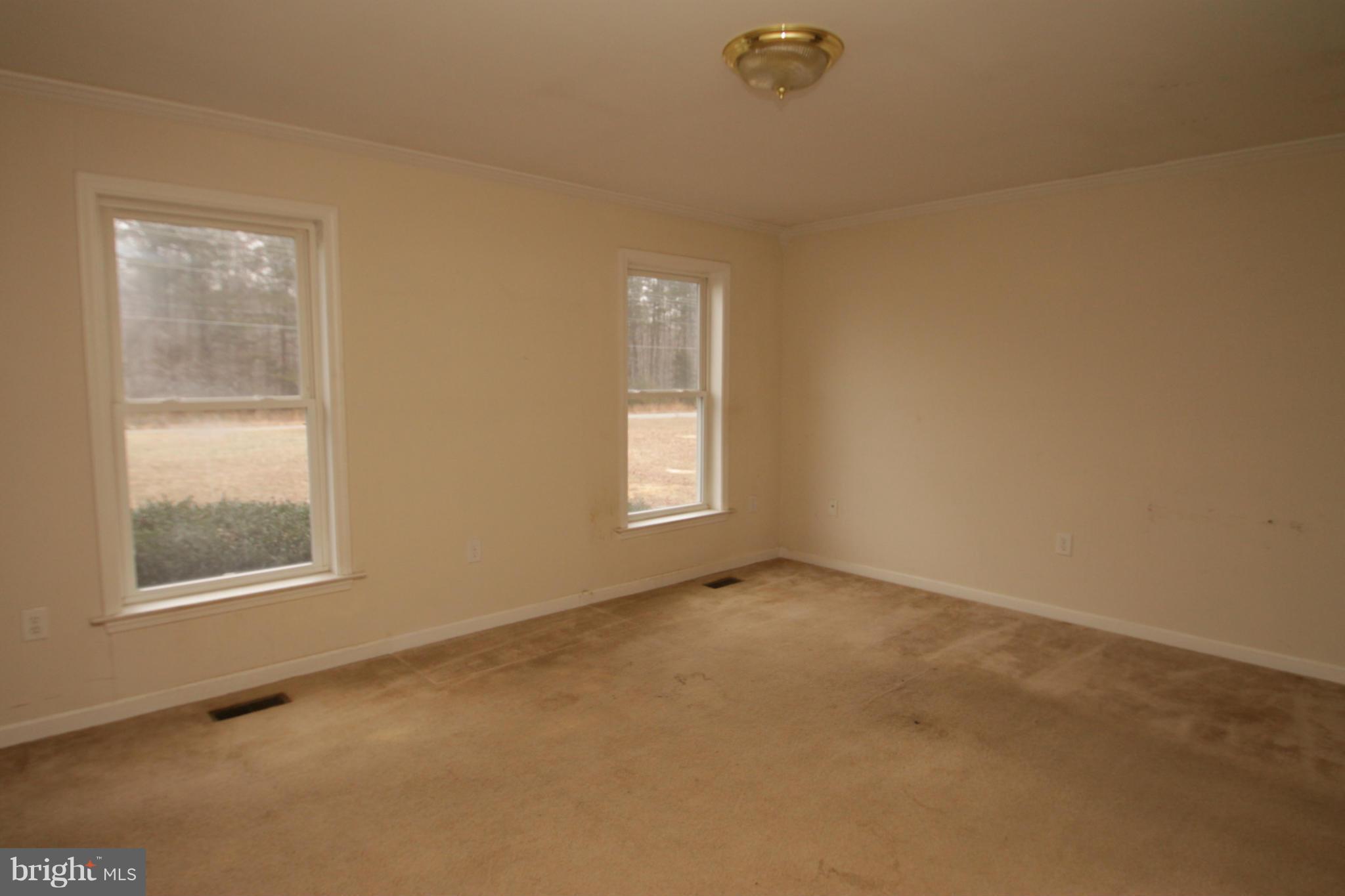2324 Partlow Road Beaverdam, VA 23015 - Photo 10 of 27 an empty room with a window