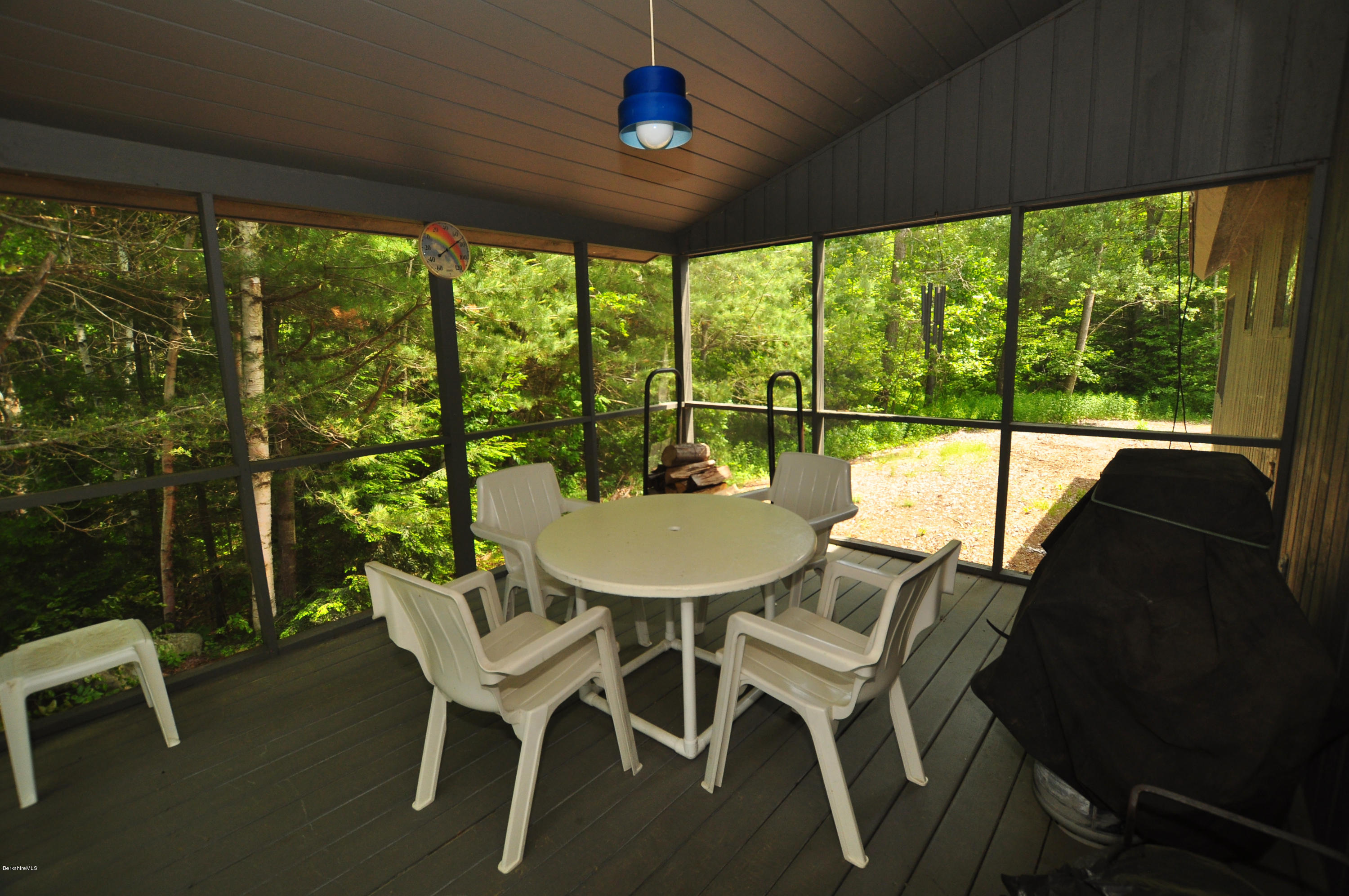 62 Algerie Road Becket, MA 01223 - Photo 14 of 29 a view of a dining room with furniture window and outside view