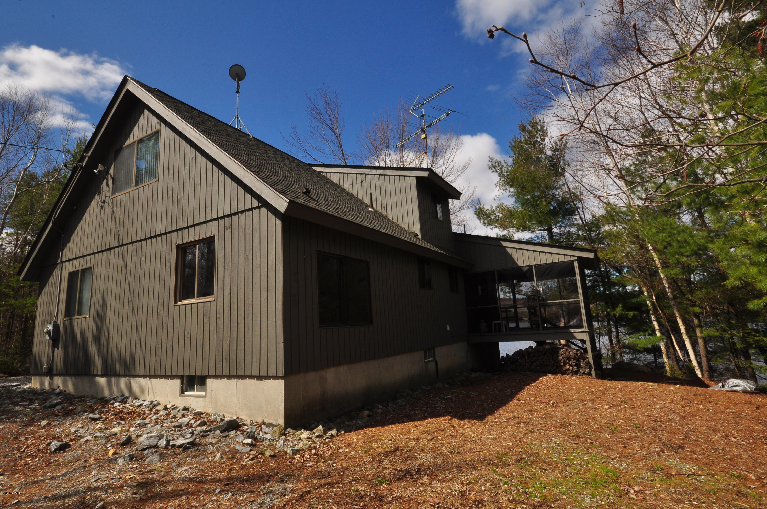 62 Algerie Road Becket, MA 01223 - Photo 4 of 29 a front view of a house