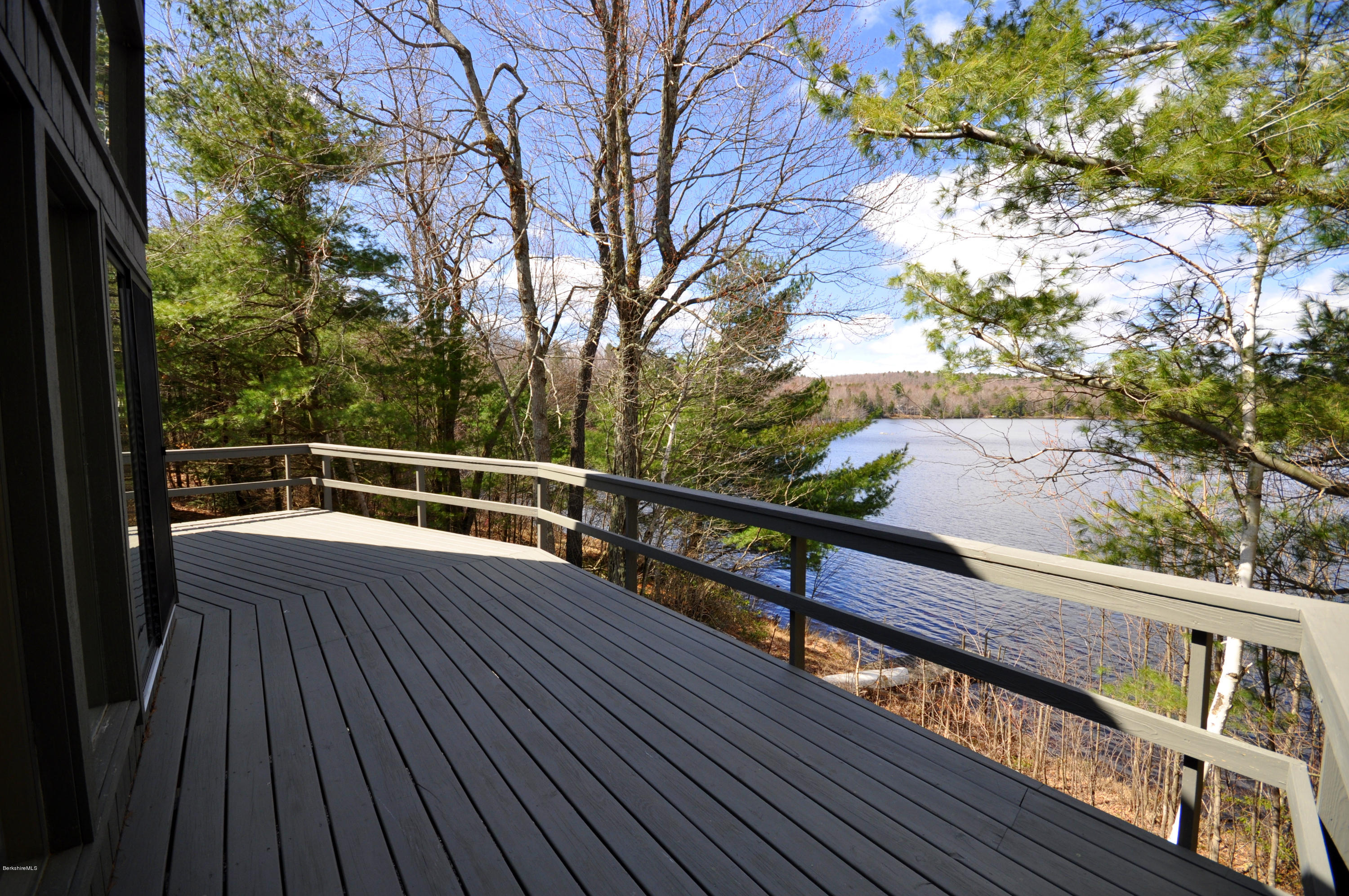 62 Algerie Road Becket, MA 01223 - Photo 6 of 29 a view of balcony with wooden floor and fence