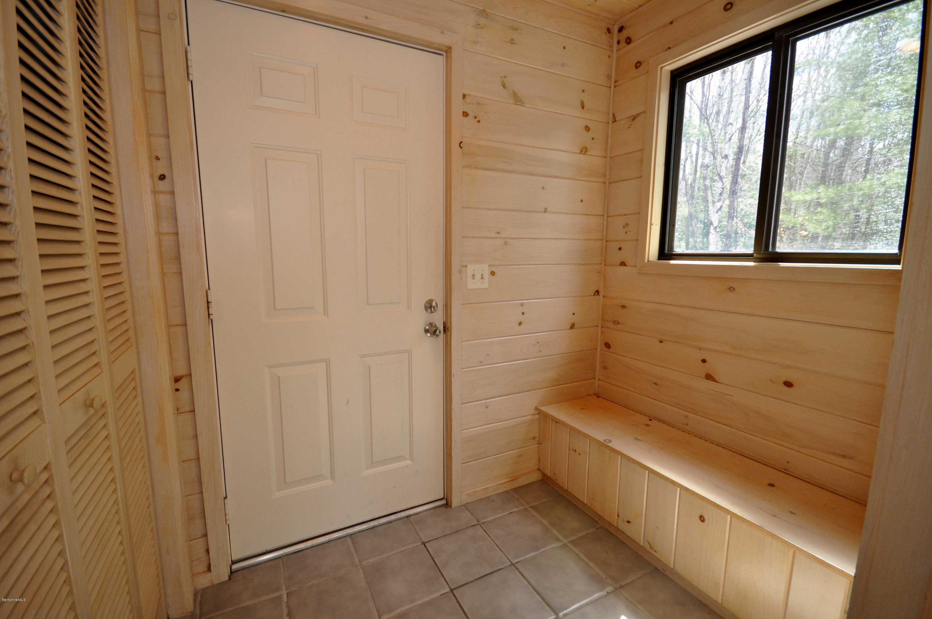 62 Algerie Road Becket, MA 01223 - Photo 8 of 29 a bathroom with a bathtub and window